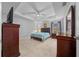 Bright bedroom with tiled floors and ceiling fan at 6 Bahia Course Way, Ocala, FL 34472