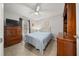 Bedroom with a full-size bed and wood furniture at 6 Bahia Course Way, Ocala, FL 34472
