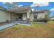 Front porch with covered seating area and walkway at 6 Bahia Course Way, Ocala, FL 34472