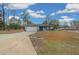 Ranch-style home with garage and landscaped yard at 6 Bahia Course Way, Ocala, FL 34472