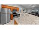 Kitchen boasts stainless steel appliances and granite countertops at 6 Bahia Course Way, Ocala, FL 34472