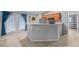 Modern kitchen with stainless steel appliances and breakfast bar at 6 Bahia Course Way, Ocala, FL 34472