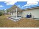 Covered patio with concrete flooring and side yard view at 6 Bahia Course Way, Ocala, FL 34472
