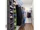 Well-organized closet space with shelving, storage and hanging clothes at 6411 Sw 78Th Avenue Rd, Ocala, FL 34474