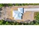 Aerial view highlighting the modern roof design and layout of the property at 6877 Sw 131St Cir, Ocala, FL 34481