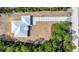 Bird's eye view showing the home's roof and surrounding landscape at 6877 Sw 131St Cir, Ocala, FL 34481