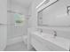 Clean bathroom featuring a modern vanity with double sinks and a shower-tub combination at 6877 Sw 131St Cir, Ocala, FL 34481