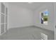 Clean bedroom with modern closet and view of outside at 6877 Sw 131St Cir, Ocala, FL 34481