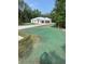 Charming single story home features a two-car garage, freshly seeded yard, and a concrete driveway at 6877 Sw 131St Cir, Ocala, FL 34481