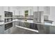 Modern kitchen featuring granite countertops, a stainless steel farmhouse sink, and stainless steel appliances at 6877 Sw 131St Cir, Ocala, FL 34481