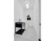 Well-lit laundry room with a modern sink and storage, featuring a window at 6877 Sw 131St Cir, Ocala, FL 34481