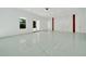Bright and airy living space with a sliding door and large windows that capture natural light at 6877 Sw 131St Cir, Ocala, FL 34481