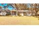 Charming single-story home with a well-manicured lawn and mature trees in a tranquil setting at 691 Se 19Th St, Ocala, FL 34471