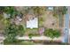 Aerial view of the house and property showing the roof, yard and street at 70 Se 81St Pl, Ocala, FL 34480