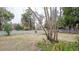 Spacious backyard with a large, fenced area and mature trees at 70 Se 81St Pl, Ocala, FL 34480