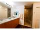 Main bathroom with double sinks and walk-in shower at 70 Se 81St Pl, Ocala, FL 34480