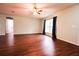 Large living room featuring hardwood floors and ceiling fan at 70 Se 81St Pl, Ocala, FL 34480