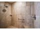 Large walk-in shower with tiled walls and seat at 70 Se 81St Pl, Ocala, FL 34480