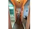 Hallway with access to bathroom and living room at 7632 Sw 112Th Ln, Ocala, FL 34476