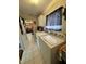 Laundry room with washer, dryer, and storage cabinets at 7632 Sw 112Th Ln, Ocala, FL 34476