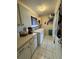 Laundry room with washer, dryer, and ample counter space at 7632 Sw 112Th Ln, Ocala, FL 34476