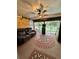 Sunroom with two reclining chairs and access to backyard at 7632 Sw 112Th Ln, Ocala, FL 34476