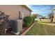 Outside air conditioning unit and landscaping at 7729 Sw 85Th Cir, Ocala, FL 34481