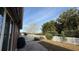 Backyard with patio, grill, and privacy fence at 7729 Sw 85Th Cir, Ocala, FL 34481