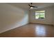Spacious bedroom with tile floors and a large window at 7729 Sw 85Th Cir, Ocala, FL 34481