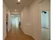 Hallway with tile floors and access to laundry at 7729 Sw 85Th Cir, Ocala, FL 34481