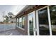 Exterior view of home with patio and awning at 7729 Sw 85Th Cir, Ocala, FL 34481