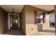 Inviting entryway with red door and red shutters at 7729 Sw 85Th Cir, Ocala, FL 34481