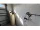Garage with water softener and electrical panel at 7729 Sw 85Th Cir, Ocala, FL 34481