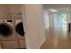 Convenient laundry room with washer and dryer at 7729 Sw 85Th Cir, Ocala, FL 34481