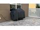 Covered gas grill on paver patio next to house at 7729 Sw 85Th Cir, Ocala, FL 34481