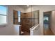Walk-in shower with tiled walls and a built-in seat at 7729 Sw 85Th Cir, Ocala, FL 34481