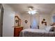 Bedroom with wooden dresser and ceiling fan at 7990 Midway Drive Ter # M102, Ocala, FL 34472