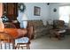 Small dining area with a round wooden table and four chairs at 7990 Midway Drive Ter # M102, Ocala, FL 34472