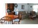 Small dining area with a round wooden table and four chairs at 7990 Midway Drive Ter # M102, Ocala, FL 34472