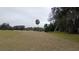 View of a lush green golf course with oak trees at 7990 Midway Drive Ter # M102, Ocala, FL 34472