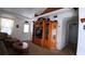 Living room showcasing a large wooden entertainment center and comfortable seating at 7990 Midway Drive Ter # M102, Ocala, FL 34472