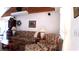 Cozy living room with floral sofas and wood accents at 7990 Midway Drive Ter # M102, Ocala, FL 34472