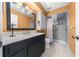Updated bathroom with a walk-in shower and modern vanity at 8111 Sw 108Th Street Rd, Ocala, FL 34481