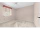 Empty bedroom with carpeted floor and ceiling fan at 8111 Sw 108Th Street Rd, Ocala, FL 34481