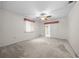 Bright bedroom featuring a ceiling fan and carpet at 8111 Sw 108Th Street Rd, Ocala, FL 34481