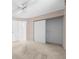 Spacious bedroom with sliding closet doors and ceiling fan at 8111 Sw 108Th Street Rd, Ocala, FL 34481