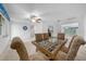 Bright dining room with glass-top table and four chairs at 8111 Sw 108Th Street Rd, Ocala, FL 34481