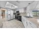 Kitchen with stainless steel appliances and white cabinets at 8111 Sw 108Th Street Rd, Ocala, FL 34481