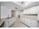 View of kitchen with white cabinets and stainless steel appliances at 8111 Sw 108Th Street Rd, Ocala, FL 34481
