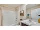 Clean bathroom with a tub, sink, and modern decor at 8666 Sw 44Th Ter, Ocala, FL 34476